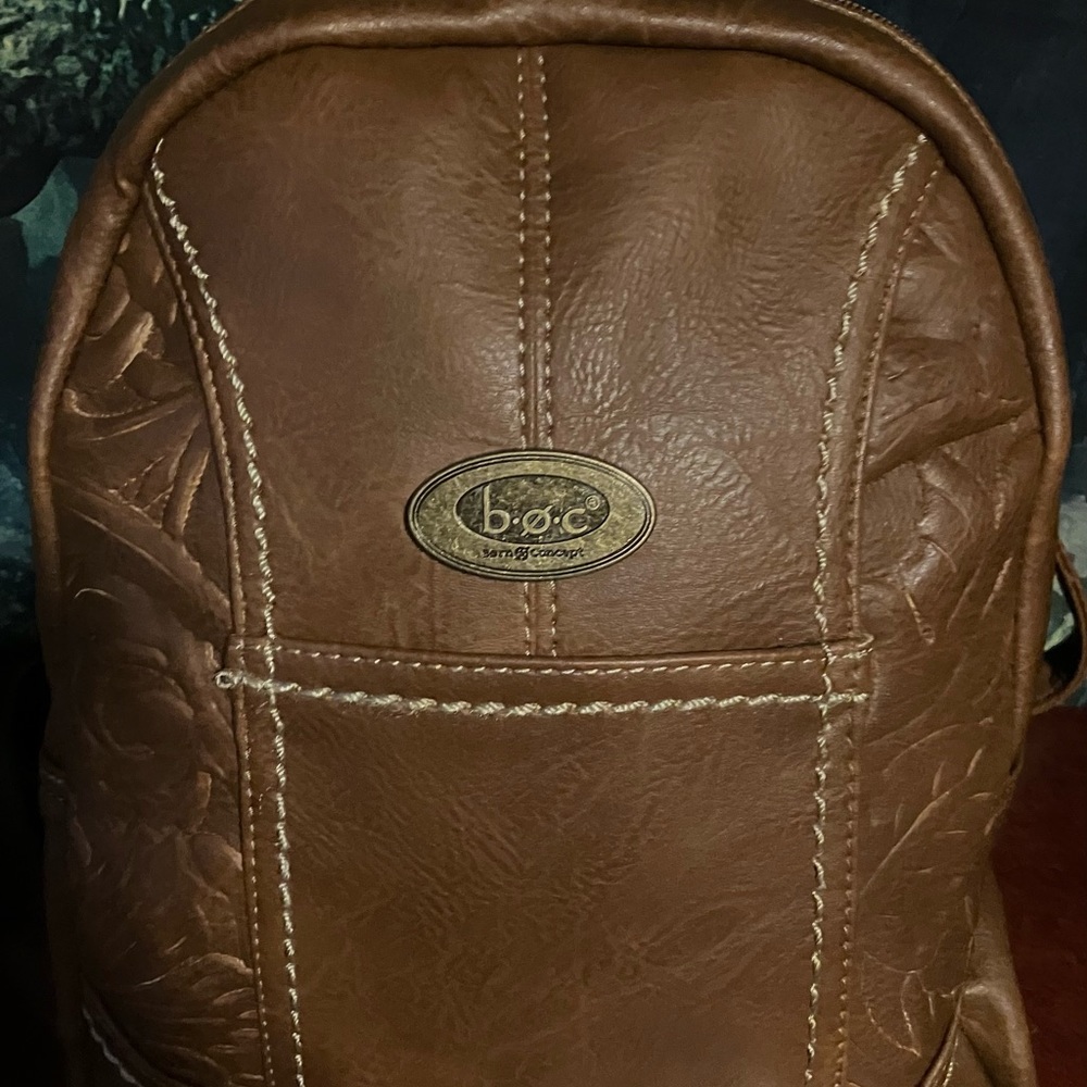 Brown leather Born Concept Backpack.